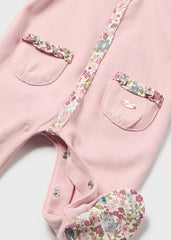 Mameluco rosa baby delineado floral