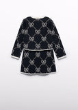 Conj. Falda tricot jacquard lazos negro