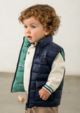 Chaleco reversible azul-carritos