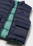 Chaleco reversible azul-carritos